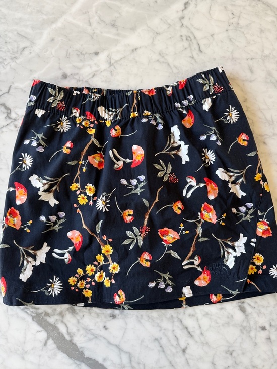 The North Face Dresses & Skirts - The north face flowers and mushrooms skirt over shorts. Skort NWT. Medium.